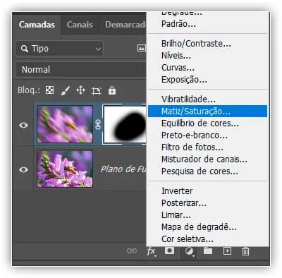 Selecionando uma camada de ajuste de Matiz/Saturação.