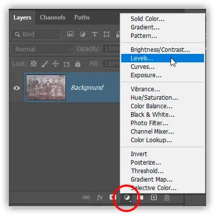Adicionando uma camada de ajuste de Níveis acima da imagem.