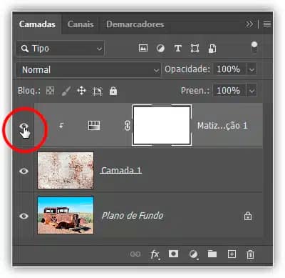 Clicando no ícone de visibilidade da camada de ajuste Matiz/Saturação.