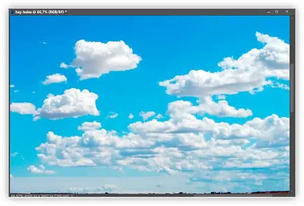 Como misturar texto em nuvens com o Photoshop