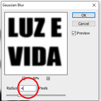 Configurando o valor Radius para 4 pixels Efeito de texto com explosão de luz